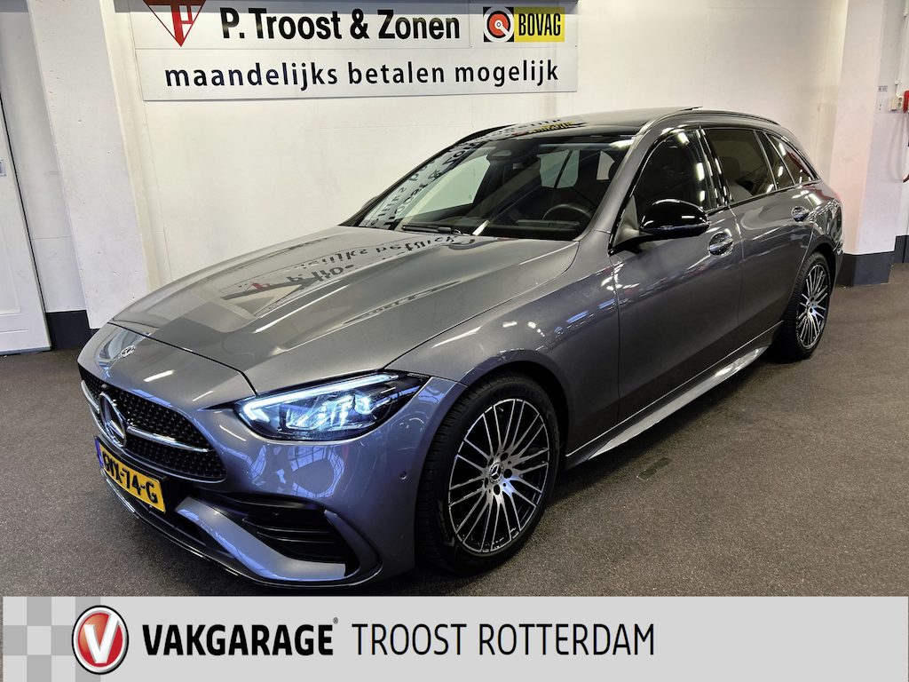 Mercedes-Benz C-klasse Estate 200 4MATIC AMG Line | Panoramadak | Elek. wegklapbare trekhaak | Memory seats | Achteruitrijcamera | Adaptieve cruise control | Climate control | Burmester | Sfeerverlichting | Apple carplay | Adaptief onderstel | Dodehoeksdetectie | Stoelverwarming