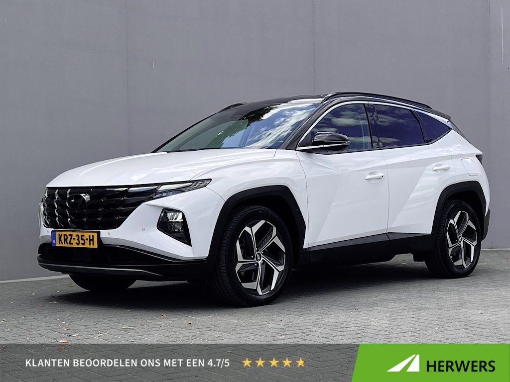 Hyundai Tucson 1.6 T-GDI PHEV Premium 4WD / Dealer Onderhouden / SOH 100 % / Lederen Bekleding / Navigatie / Electr. Stoelen met Geheugen / Stoelventilatie / Stuur-, Stoel- & Achterbankverwarming / Apple Carplay & Android Auto /