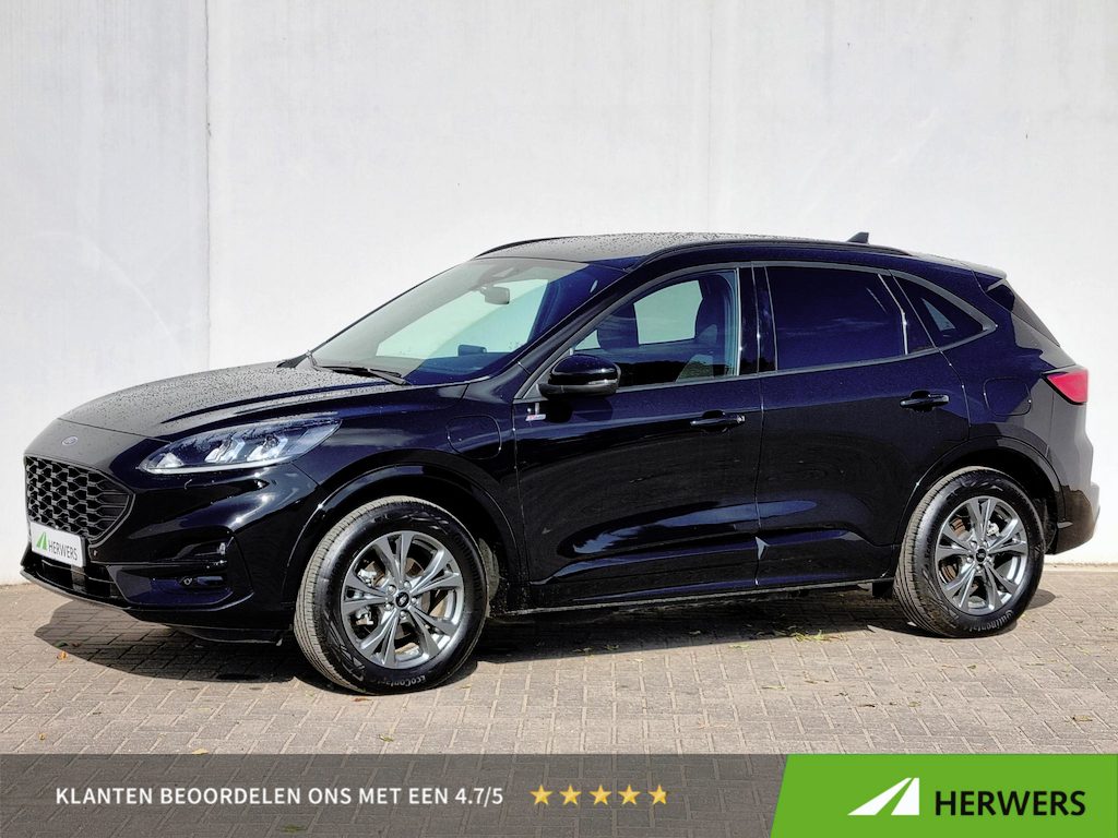 Ford Kuga 2.5 PHEV ST-Line / SOH 96.65% / Apple Carplay & Android Auto / Stoel & Stuurverwarming & Achterbank Verwarming / Achteruitrijcamera / Voorruit Verwarming / Navigatie / Climate Control / Navigatie /