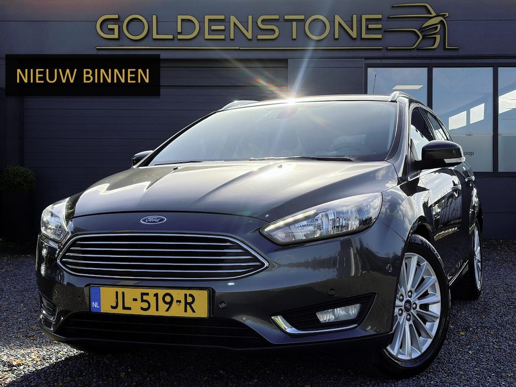 Ford Focus Wagon 1.0 Titanium ✓2e Eigenaar✓125pk✓Trekhaak✓6 Bak✓Dealer Onderhouden✓Navi✓Clima✓Cruise✓Pdc V+A✓Lm velgen✓N.A.P✓Apk tot 11-2027