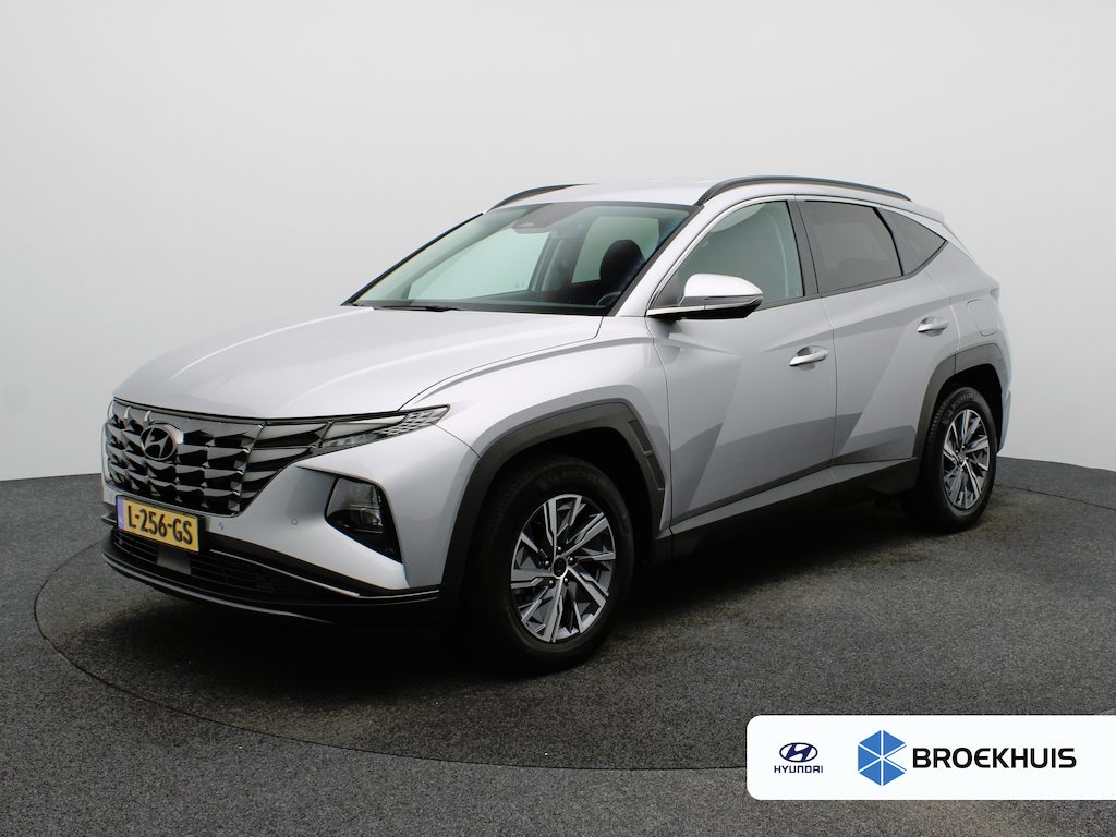 Hyundai Tucson 1.6 T-GDI HEV Comfort | Achteruitrijcamera | Airco (automatisch) | Apple Carplay/Android Auto|telefoonintegratie premium