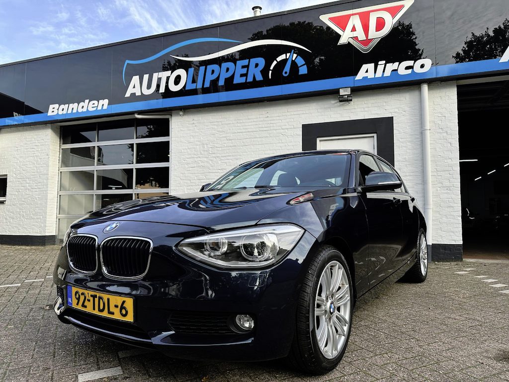 BMW 1-Serie 116i Business+ /Automaat/Nieuwe apk bij aflevering/Lm velgen/All season banden