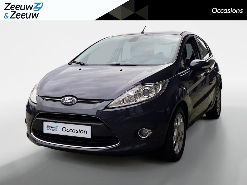 Ford Fiesta 1.4 Titanium | Voorruitverwarming | PDC | Airco | 12 maanden BOVAG garantie