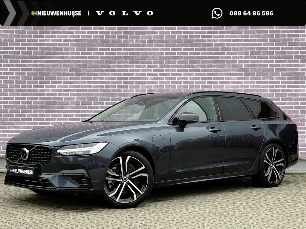 Volvo V90 2.0 T6 Plug-in hybrid AWD Ultimate Dark | Trekhaak | 20" | 360 Camera | Luchtvering | Stoel/stuur verwarming | Extra getint glas | Pilot assist | Adaptieve cruise control | Head-up display | Harman & Kardon | Elektrisch verstelbare bestuurdersstoel | Schuif/kanteldak |