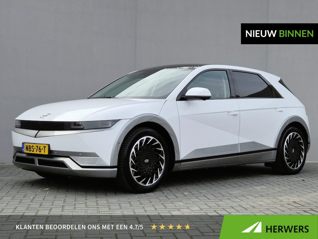 Hyundai Ioniq 5 Lounge 77.4 kWh / SOH 99% / Dealer onderhouden / Trekhaak 1.600 kg / Panoramadak / warmtepomp / Stoelventilatie / head-up display / Stuur-, stoel- en achtebankverwarming / 20" LM wielen / elektrisch achterklep / Apple Carplay Android Auto /
