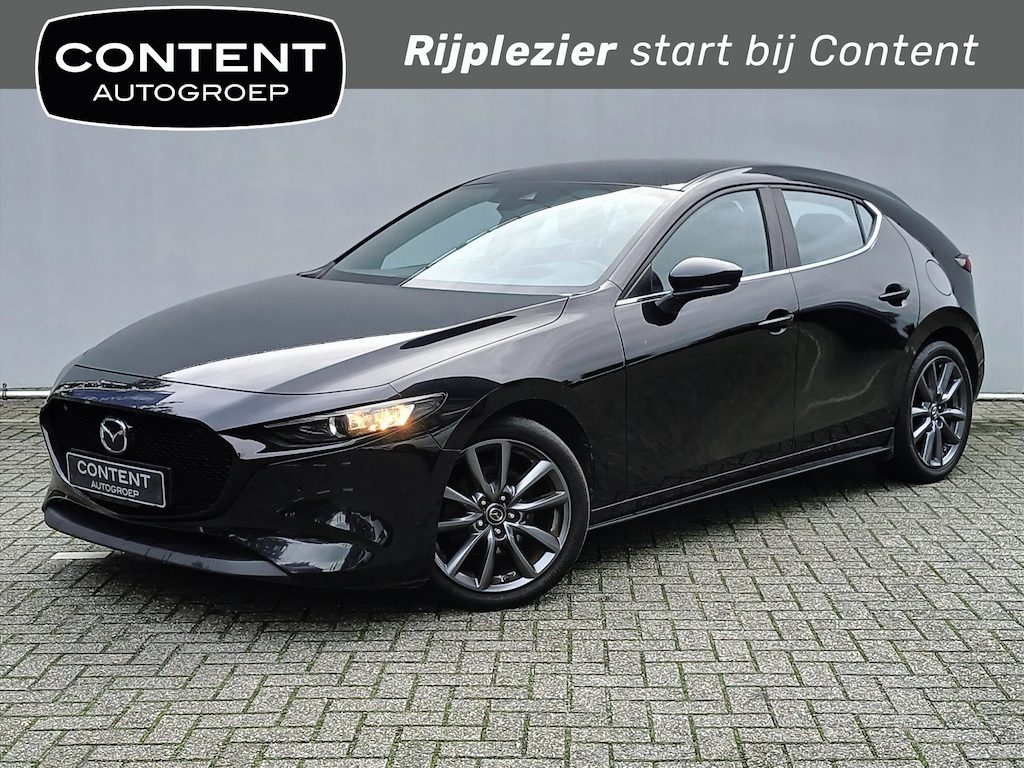 Mazda 3 e-SkyActiv-G M Hybrid Luxury + Trekhaak / HUD / Add. Cruise / Navigatie + Camera! / Stoel/stuurverwarming /