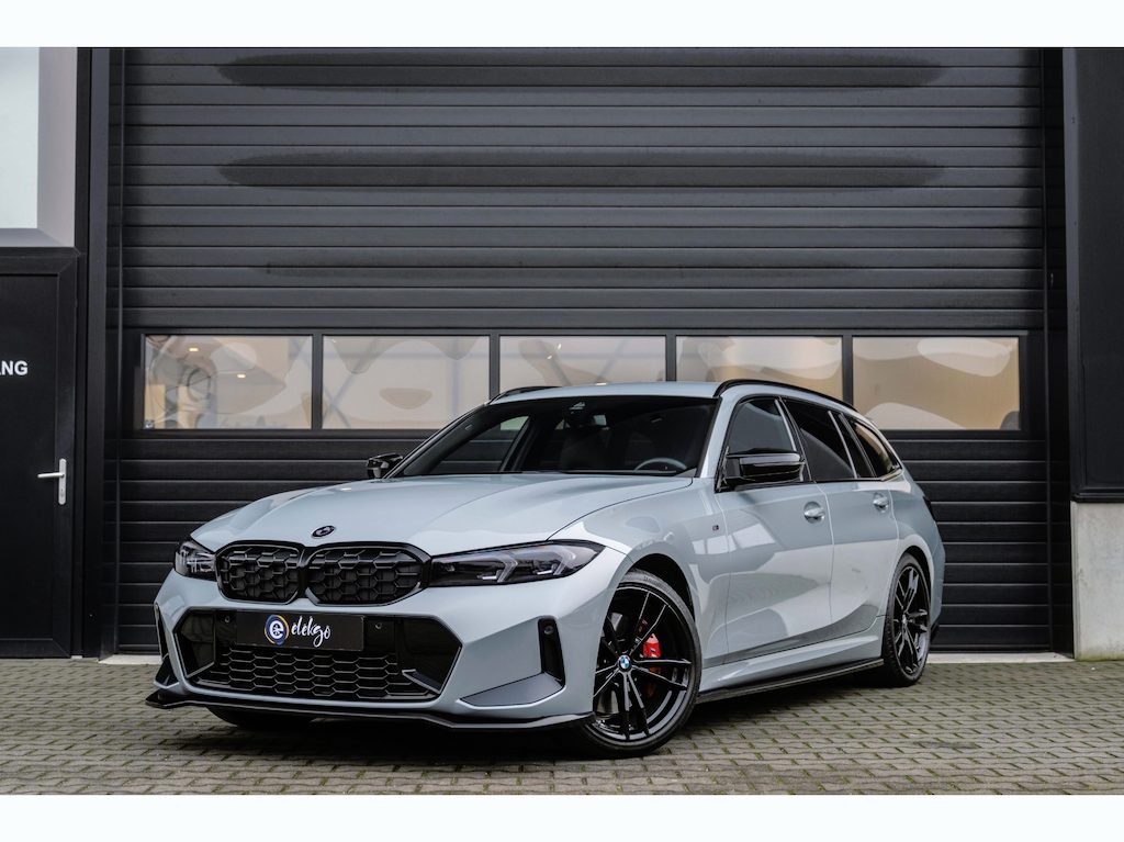 BMW 3-Serie Touring M340i xDrive Vol|Pano|Trekhaak|Harman-Kardon|HuD|Carbon|