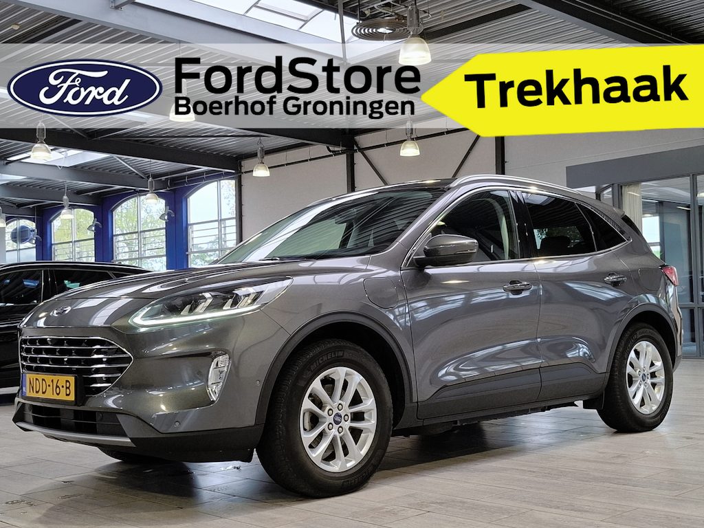 Ford Kuga 2.5 PHEV Titanium X | Trekhaak | Winter pack | SOH 84,9% | B&O | Adapt. Cruise | BLIS | Camera's | Elekt. a.klep | 4 seiz. banden | 100% Dealer onderhouden |