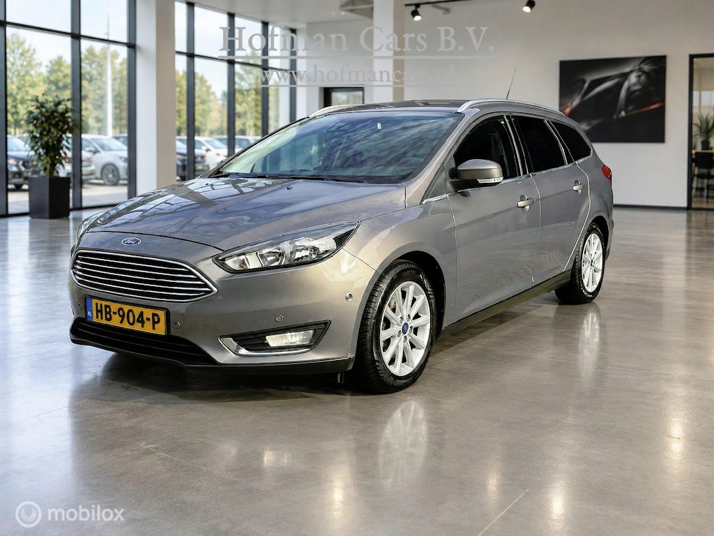 Ford Focus Wagon 1.5 Titanium Edition | TREKHAAK 1.500 KG | HALF LEDER | AUTOMATISCH INPARKEREN | EXTRA SET WIELEN