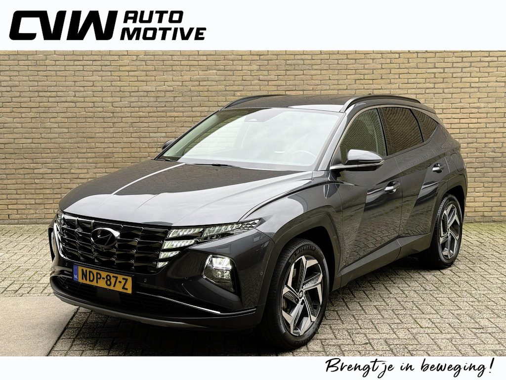 Hyundai Tucson 1.6 T-GDI 265pk PHEV Premium 4WD | Trekhaak afneembaar | Lederen bekleding | 360 camera | Navigatie | Stoelverwarming&ventilatie | Stuurverwarming | Keyless | LED | DAB| Apple CarPlay / Android Auto | Adaptieve cruise | Lane assist | Dodehoekdetectie | Elektrisch verstelbare stoel memory | Elektrische achterklep | Volledig dealeronderhouden | Fabrieksgarantie