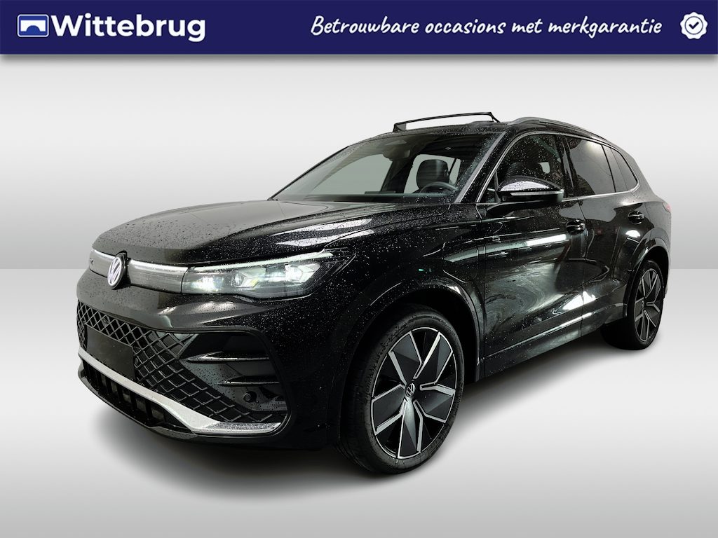 Volkswagen Tiguan 1.5 eHybrid R-Line / FABRIEKSGARANTIE TOT 02-2028/ AUTOMAAT/ LEDER/ TREKHAAK/ PANO/ MEMORY SEAT/ NAVI/ APP-CONNECT/ STOELVERWARMING & -KOELING/ 360 CAMERA
