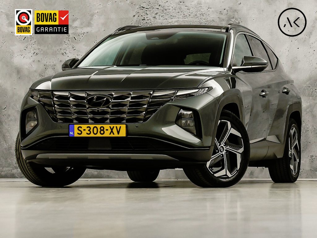 Hyundai Tucson 1.6 T-GDI HEV Premium Sky 230Pk Automaat (PANORAMADAK, STOELKOELING/VERWARMING, KRELL AUDIO, 360 CAMERA, ACHTERBANK VERWARMD, KEYLESS, SPORTSTOELEN, ADAPTIVE CRUISE, SFEERVERLICHTING, NIEUWSTAAT)