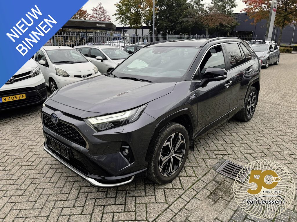Toyota RAV4 2.5 Plug-in Hybrid AWD Style TREKHAAK APPLE/ANDROID LEDER STOEL/STUUR/VOORRUITVERWARM. ELEK. ACHTERKLEP. 1.500KG-TREK. CAMERA P-SENSOREN KEYLESS