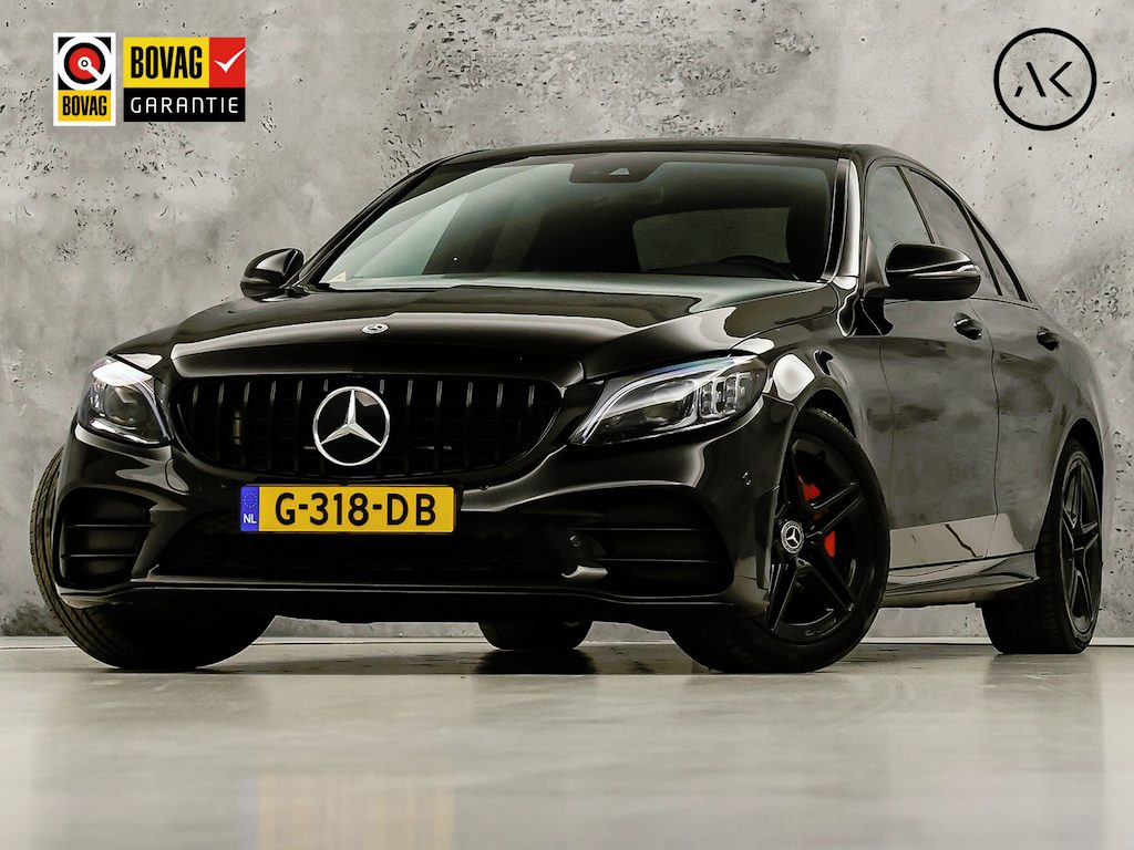Mercedes-Benz C-klasse 200 AMG Sport 184Pk Automaat (PANORAMADAK, FACELIFT, VIRTUAL COCKPIT, APPLE CARPLAY, RODE GORDELS, CAMERA, SPORTSTOELEN, GETINT GLAS, SFEERVERLICHTING, NIEUWSTAAT)