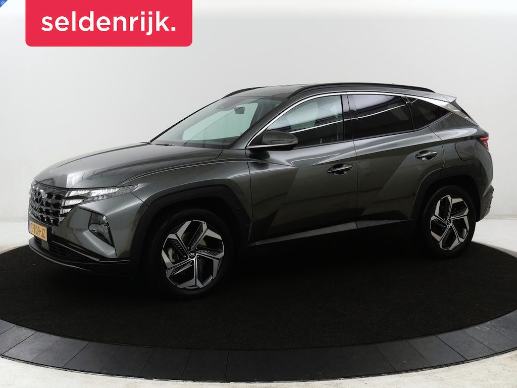 Hyundai Tucson 1.6 T-GDI HEV Premium | Leder | Memory | Trekhaak | Adaptive cruise | Stuur/stoelverwarming | 360 Camera | Park assist | Carplay | Climate control