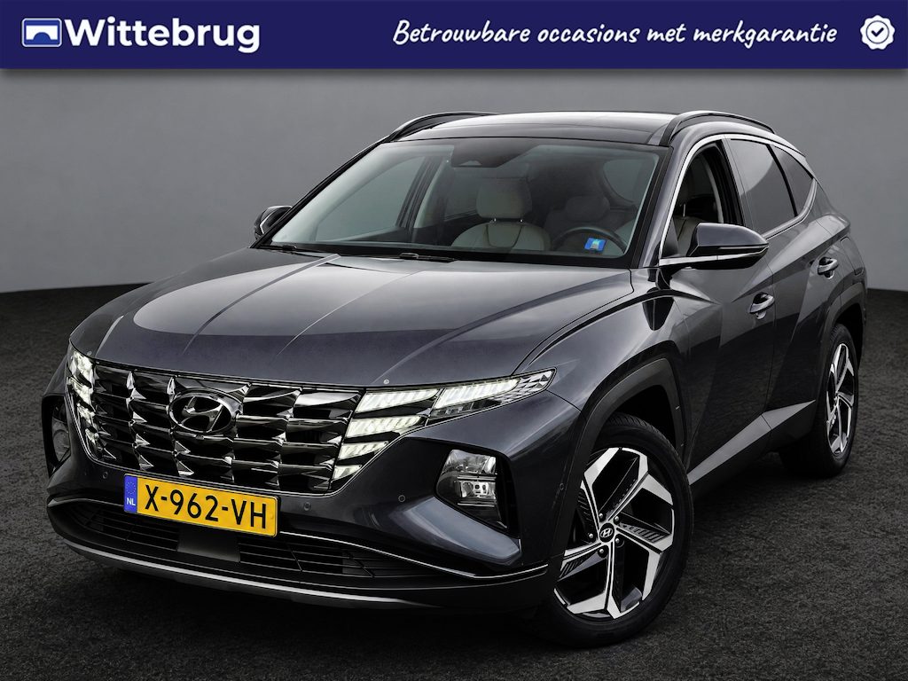 Hyundai Tucson 1.6 T-GDI HEV Premium Sky OPEN DAK | LEDER MET LICHT INTERIEUR | 19 INCH | TREKHAAK | ZEER COMPLEET!