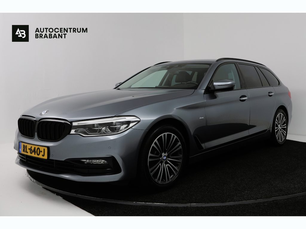 BMW 5-Serie Touring 520i High Executive (COMFORT ZETELS, CAMERA, SFEERVERLICHTING, STOELVERWARMING)
