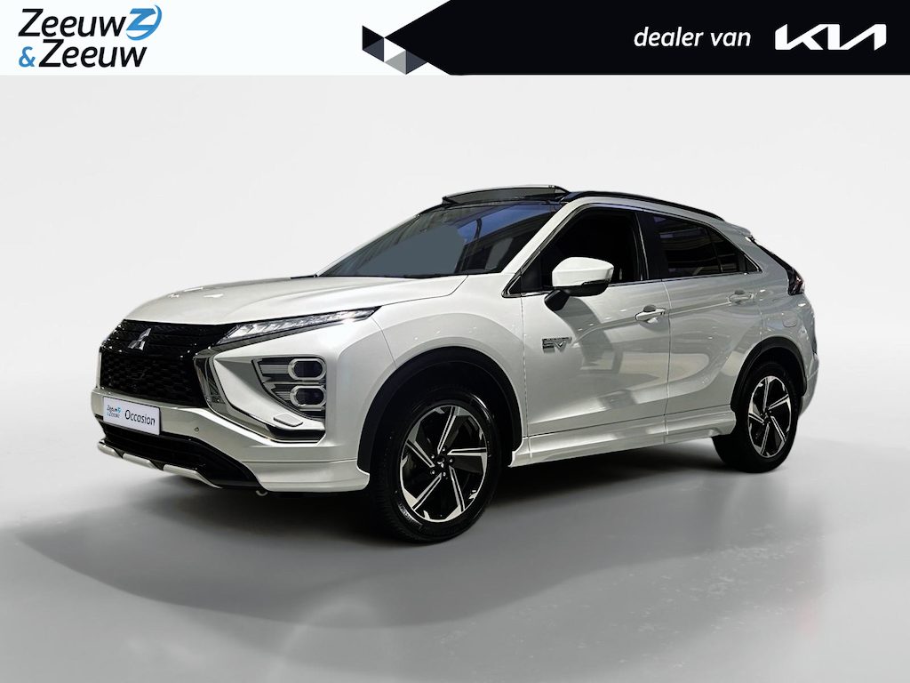Mitsubishi Eclipse Cross 2.4 PHEV Prestige | All-Seasonbanden | Trekhaak + 13-Polige Stekker | Glazen schuif-/kanteldak | Stoel- en stuurverwarming | Elektrisch verstelbare Voorstoelen | Apple Carplay / Android Auto | Parkeersensoren Voor + Achter | Camera Achter | Cruise Control | Licht + Regensensor