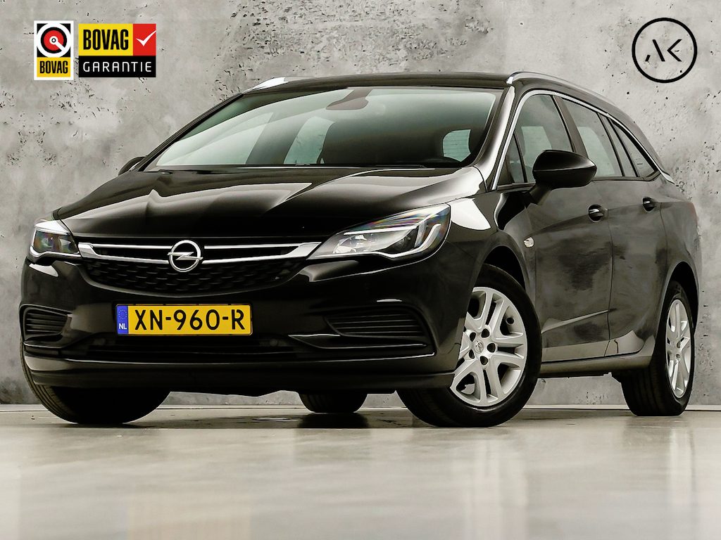 Opel Astra Sports Tourer 1.4 Turbo Business+ 150Pk (APPLE CARPLAY, NAVIGATIE, CLIMATE, CAMERA, SPORTSTOELEN, LM VELGEN, CRUISE, NIEUWSTAAT)