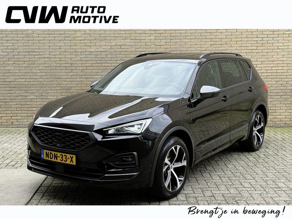SEAT Tarraco 1.4 TSI 245pk e-Hybrid PHEV FR | Trekhaak | Leder | 360 camera | Stoelverwarming voor&achter | Elektrische achterklep | 19 inch velgen | Adaptieve cruise | Lane assist | Apple CarPlay / Android Auto | Blackline | Keyless | Full-LED | DAB | Volledig onderhouden