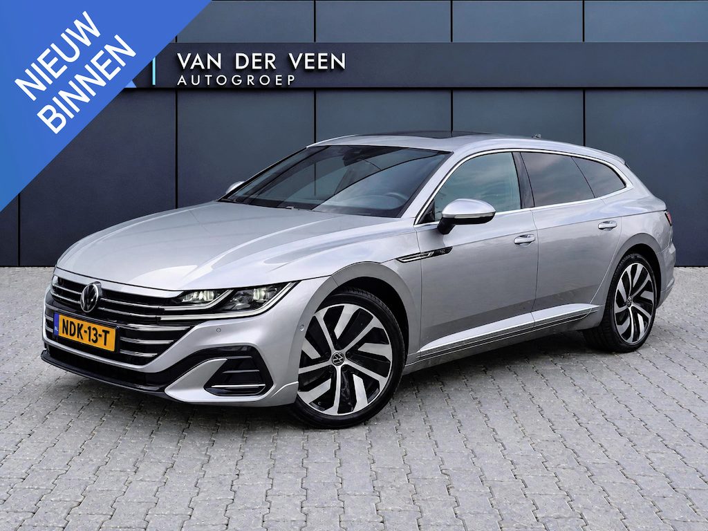 Volkswagen Arteon Shooting Brake 1.4 TSI eHybrid R-Line Business+ | Incl. 12 maanden Garantie | SOH 100% | Elektrisch verstelbare R-Line sportstoelen in leder/Carbon-look met memory en massagefunctie | Parkeersensoren v/a | 19 Inch LMV | Keyless entry/start | Panoramadak | Achteruitrijcamera | Parkeerassistent | Stoelverwarming v/a | Adaptive cruise control | Lane assist | Elektrische ramen v/a | Schakelmogelijkheid aan het stuur | Elektrische kofferbakklep | AppleCarplay/Android auto | Bluetooth | DAB | Navigatie | Climate control |