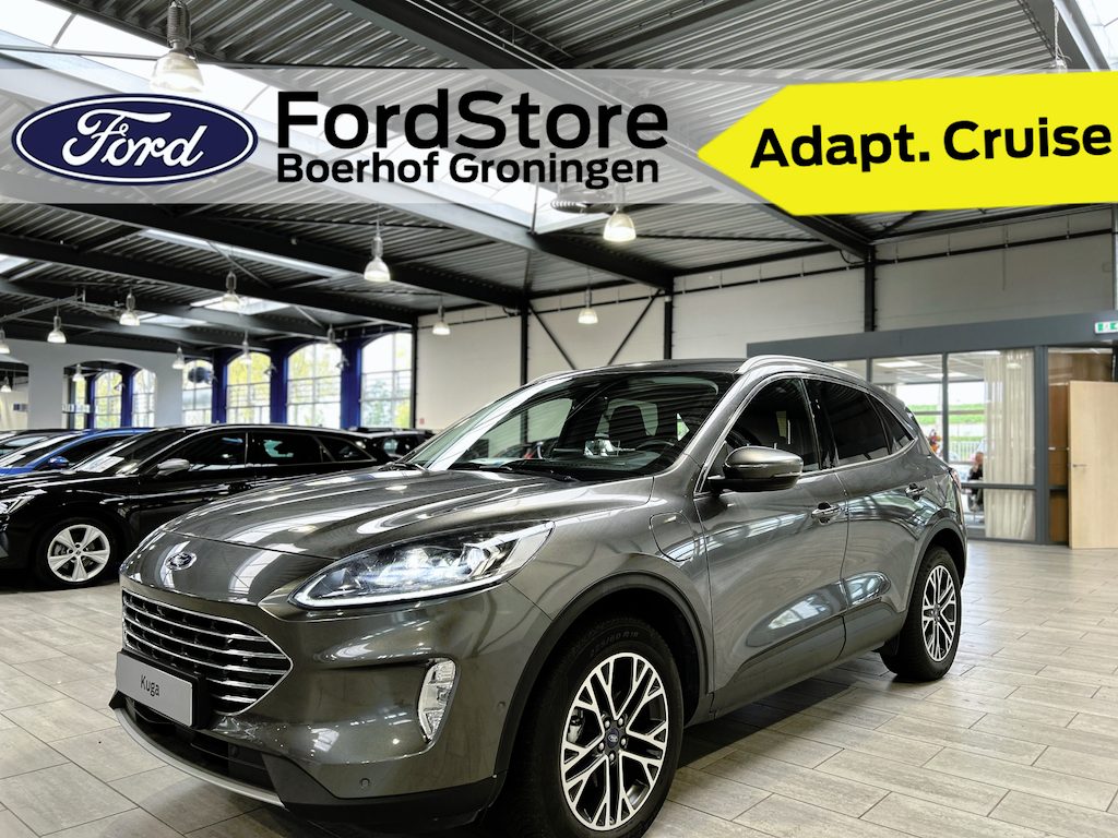 Ford Kuga 2.5 PHEV Titanium | Winter pack | SOH 91,5% | Adapt. Cruise | BLIS | Camera's | Elekt. a.klep | 4 seiz. banden | 100% Dealer onderhouden |