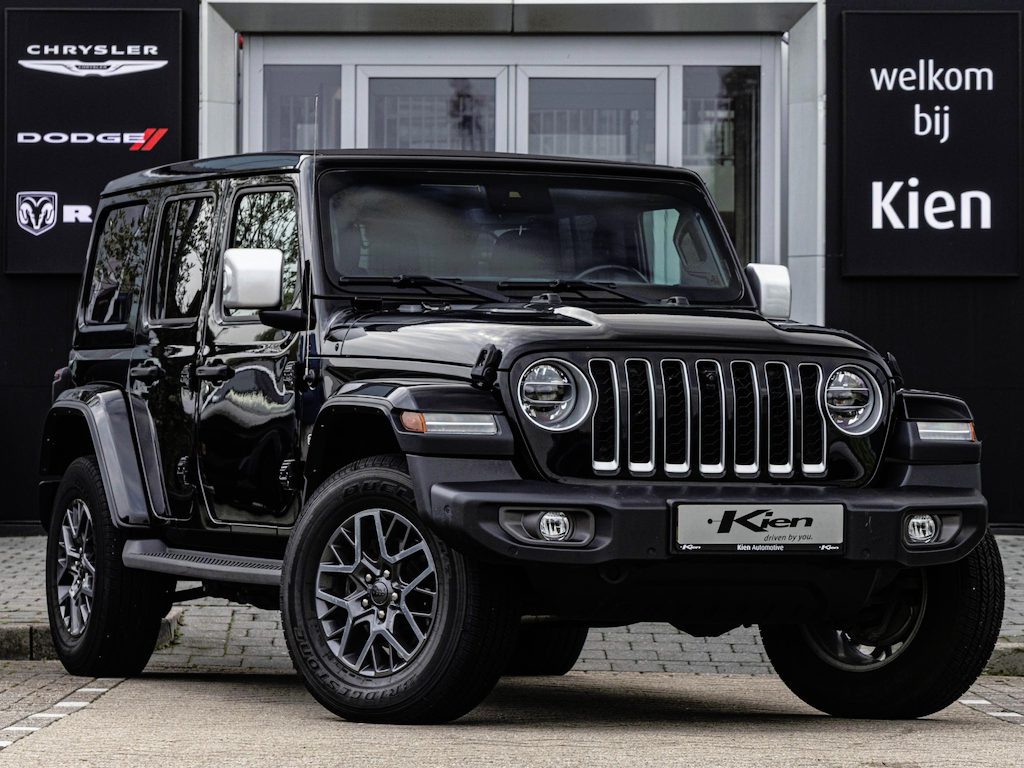 Jeep Wrangler Unlimited 4xe 380 Sahara | Leder | Cruise Control | Sky roof | Camera | Stoel + stuurverwarming | Navigatie | 18 '' |