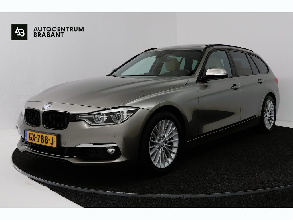 BMW 3-Serie 320i Luxury (PANORAMADAK, HEAD-UP, DEALER ONDERHOUDEN, MEMORY SEATS, 360 CAMERA)