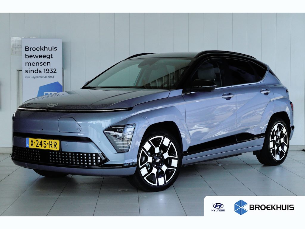 Hyundai Kona Electric Premium 65.4 kWh | Achterspoiler | Achterstoelen verwarmd | Achteruitrijcamera