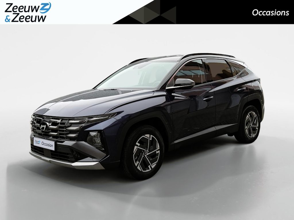 Hyundai Tucson 1.6 T-GDI HEV Comfort Smart | Navigatie | Achteruitrijcamera | Stuur-/Stoelverwarming | Parkeersensoren voor & achter | Elektrische achterklep |