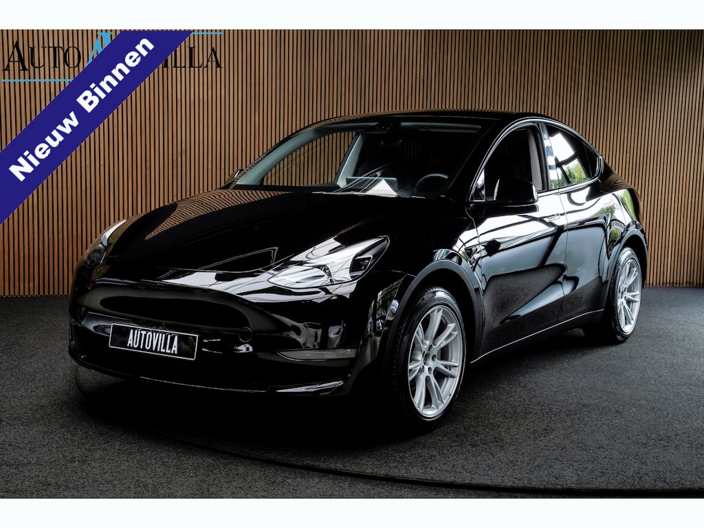 Tesla Model Y Long Range Dual - Motor AWD 75 kWh Navi Camera Leer Warmtepomp ACC Autopilot PDC Elektr. achterklep Stoelverwarmimg voor en achter Stuurverwarming BTW auto