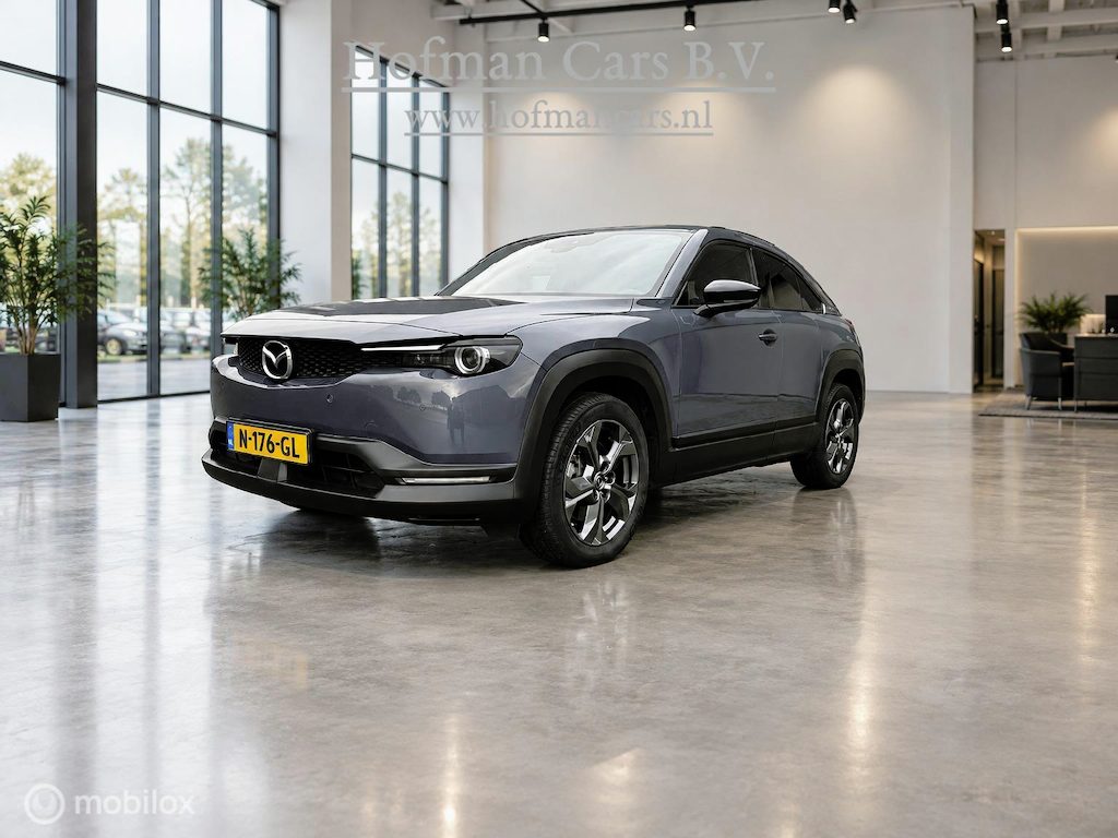 Mazda MX-30 e-SkyActiv 145 36 kWh | SOH 94% | Jeans Grijs | HUD | Memory Seats | Keyless | Half leder