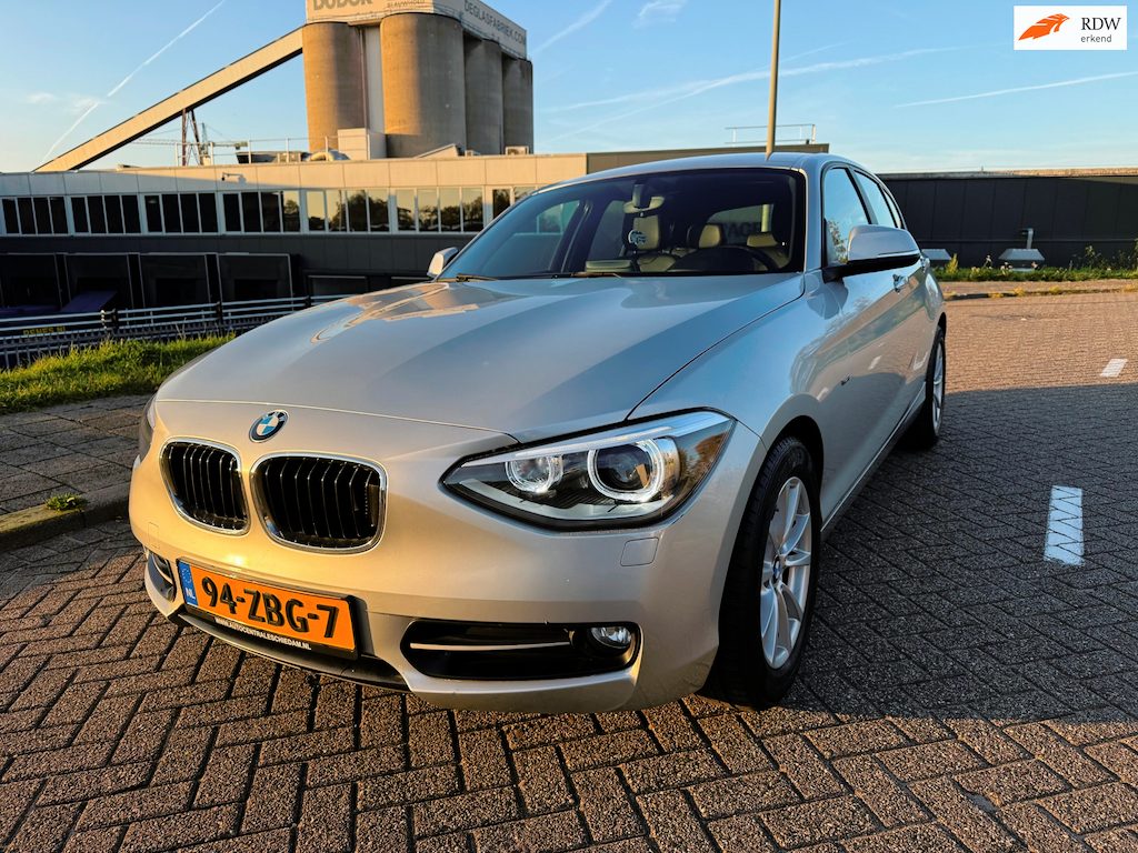 BMW 1-Serie 114i Upgrade Edition_AIRCO_LEER_NETTE AUTO