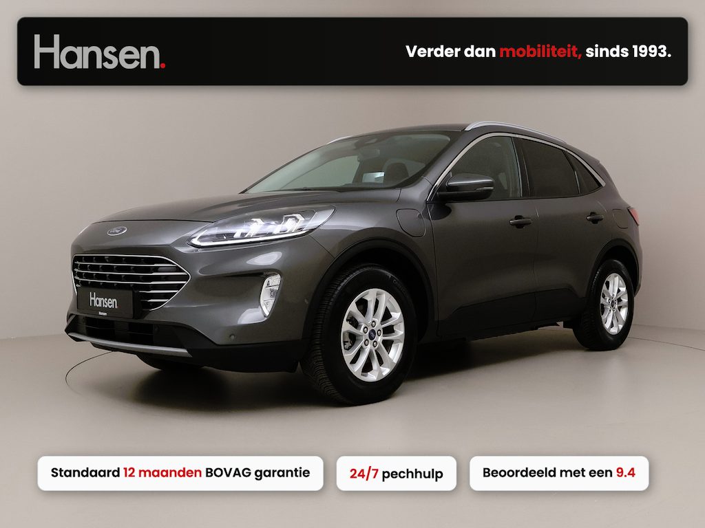 Ford Kuga 2.5 PHEV Titanium X I Adaptive Cruise I Winterpakket I Half Leder I Elek. Voorstoelen I HUD I Elek. Achterklep I Verwarmde Achterbank I