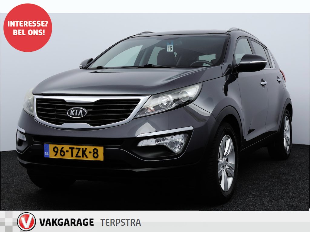 Kia Sportage 1.6 GDI X-ecutive Plus Pack/ Trekhaak/ Camera/ 17'' LMV/ Half-Leder/ Navi/ Clima/ Cruise/ Elek. pakket/ Isofix/ Bluetooth/ Armsteun/ Multi. LEDER. Stuur/ Mistl./ PDC/ Extra getint glas/ Chroom.