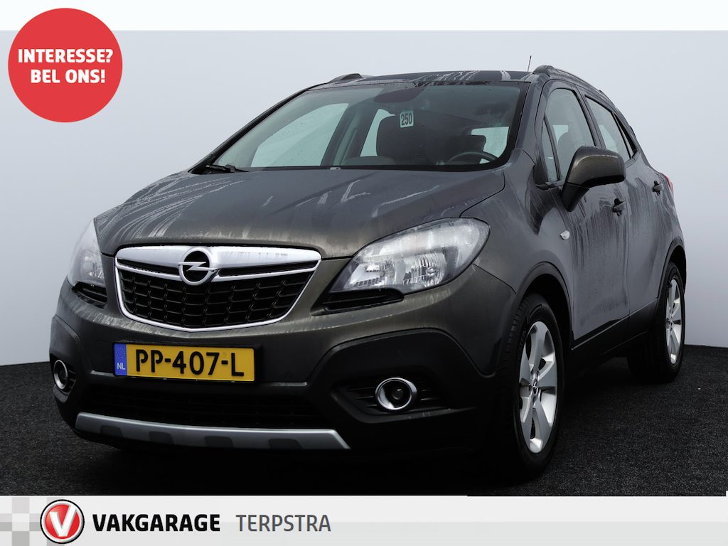 Opel Mokka 1.4 T Cosmo/ Trekhaak/ Camera/ 17'' LMV/ Navi/ Clima/ Cruise/ Elek. pakket/ Isofix/ Bluetooth/ Armsteun/ Multi. LEDER. Stuur/ Mistl./ PDC V+A/ Dagrijverl.