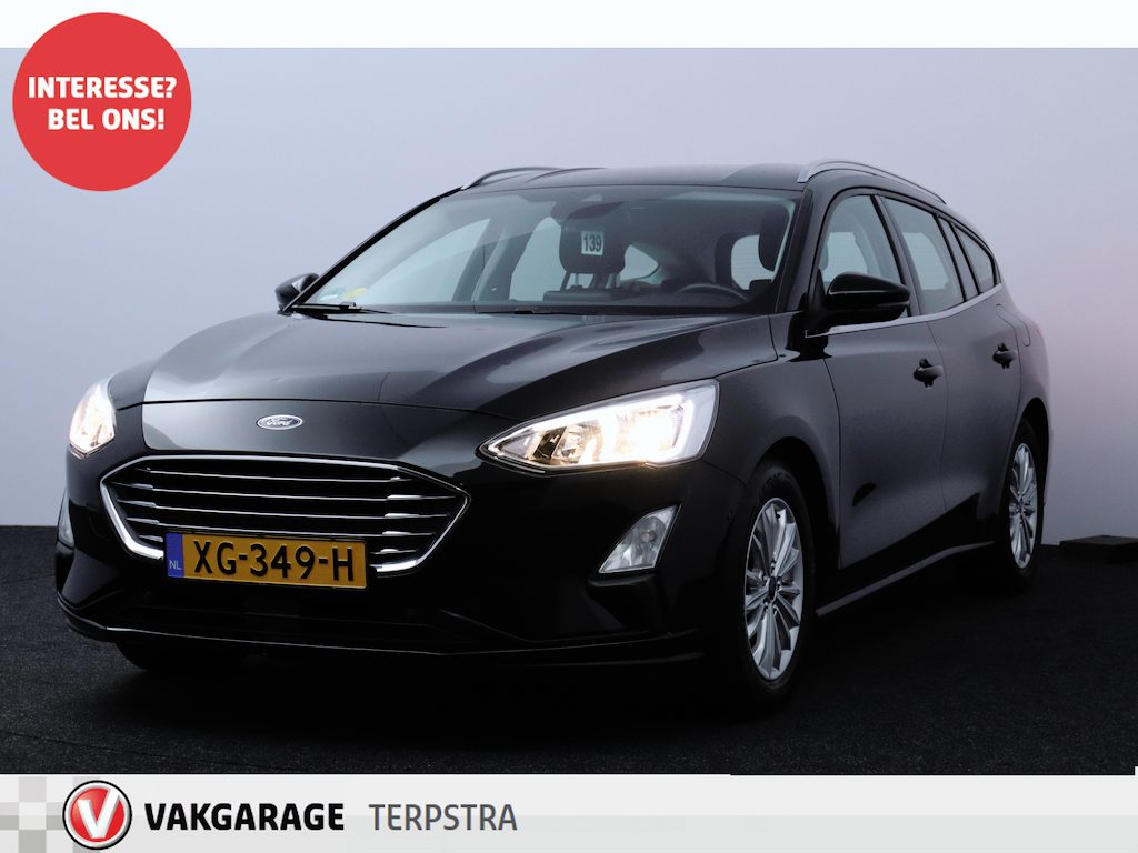 Ford Focus Wagon 1.5 EcoBlue Titanium Business/ Trekhaak/ 16'' LMV/ Keyless/ Lane-Assist./ Apple + Android/ Navi/ Clima/ Cruise/ Bluetooth/ Multi. LEDER. Stuur/ Armsteun/ PDC V+A/ Chroom/ LED Dagrijverl.