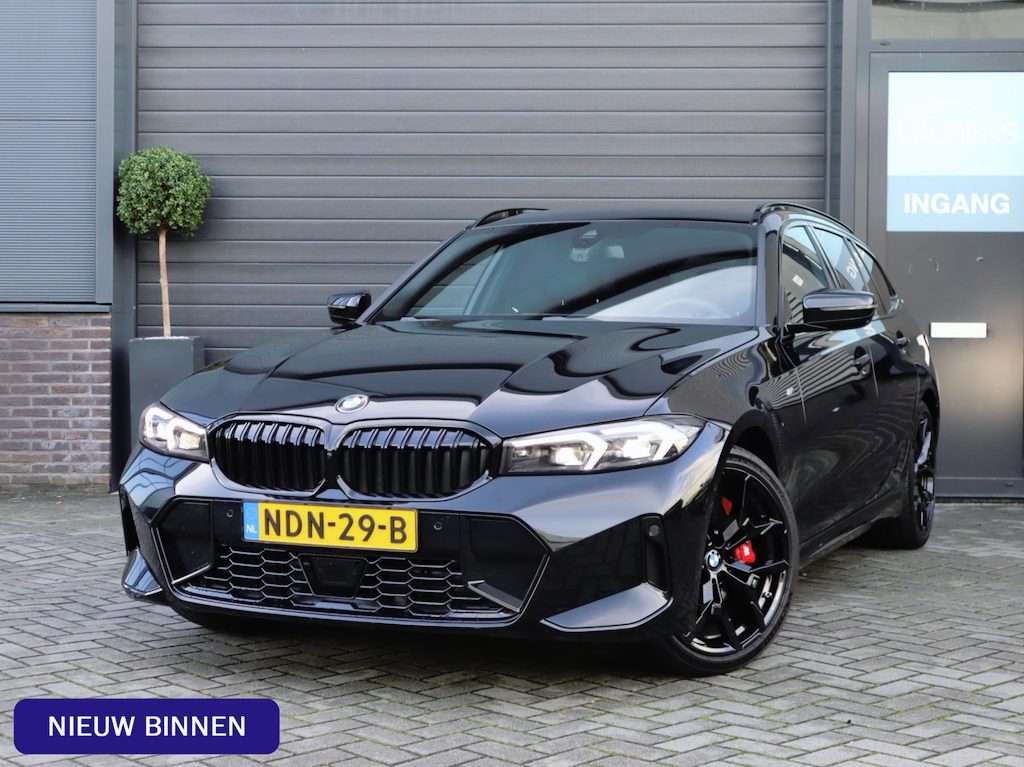 BMW 3-Serie Touring 330i xDrive | Pano | Trekhaak | 360 Camera | HUD