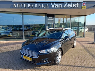 Ford Mondeo Wagon 1.5 Titanium Automaat, Airco(automatisch), Multimedia systeem, Navigatie, Bluetooth telefoonverbinding, Parkeersensoren, Stoelverwarming, Parkeerhulp, Cruise control, Rijbaan begeleiding, Elektrische ramen en spiegels, Lichtmetalen velgen, Verwarmde voorruit, Zeer nette auto, BOVAG