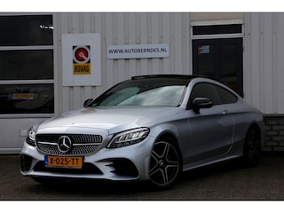 Mercedes-Benz Coupé 180 AMG 9-G Aut.*Perfect MB Onderh.*1ste Eig!*Pano/Sfeerverl./Virtual Cockpit/Diamond grille/LED Koplampen/ACC/Apple Carplay-Android/Camera/Keyless Entry + Go/Stoelverw./Memorie/Elek. Klep/Dodehoek/Rijstrook/VOL*