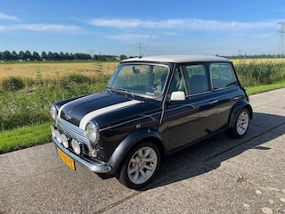 Mini Cooper 1.3 volledig gerestaureerd , tax. rapport aanwezig