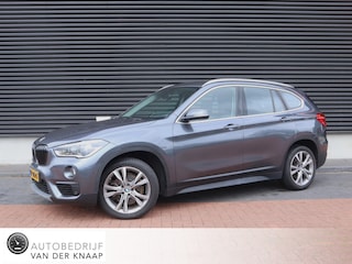 BMW X1 sDrive20i Centennial High Executive | Clima | Cruise | Navi | Leder | Stoelverwarming | Pano | Parkeer-assistent |