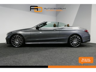 Mercedes-Benz Cabrio 180 AMG Line / Airscarf - nekverwarming / Stoelverwarming / Apple Carplay - Andriod Auto / 360 graden camera / Dodehoek sensor / Digitaal instrumentenpaneel / Agility Select / LED High Performance / Lederen bekleding / Navigatie / Cruise Control / Achteruitrijcamera / 19'' LMV