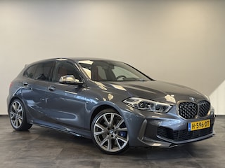 BMW M135i xDrive High Executive Edition 306PK Headup Display Sportuitlaat Navigatie PDC VCP Cruise Control 19LMV  Volleder interieur Schaal stoelen