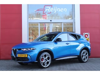 Alfa Romeo Tonale 1.3T PHEV Q4 280PK Edizione Speciale | PANORAMISCH SCHUIF / KANTELDAK | HARMAN CARDON PREMIUM AUDIO | LEDEREN BEKLEDING | VOORSTOELEN / STUUR VERWARMD | VOORSTOELEN GEVENTILEERD | VOORSTOELEN ELEKTRISCH VERSTELBAAR MET GEHEUGEN FUNCTIE |APPLE CARPLAY / ANDROID AUTO | 360° CAMERA | DODEHOEK DETECTIE | 20"INCH LICHTMETALEN VELGEN | ADAPTIVE CRUISE CONTROL | KEYLESS ENTRY / START | ELEKTRISCH BEDIENBARE ACHTERKLEP | DRAADLOZE TELEFOONLADER | SFEER VERLICHTING | DONKERE HEMELBEKLEDING |
