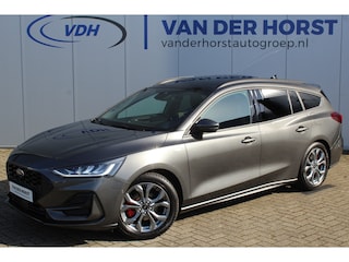 Ford Focus Wagon 1.0-125pk EcoBoost ST-Line X. Geweldig mooie, luxe en sportieve Focus wagon ! Slechts 12.000km ! Autm. airco, stoel-, stuur- en voorraamverw., ergonomische stoelen, adaptieve cruise cntrl, side- en lane assist, elektr. panodak, B&O soundsyst., etc.