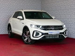 Volkswagen T-Roc 1.5 TSI 150PK R-LINE EVO IQ LIGHT ALCANTARA ELEK.KLEP CARPLAY STOEL/STUUR VERW. 18"LMV VIR.COCKPIT 10/2024 Ascotgrau 70 BIJNA NIEUWE VOLKSWAGEN'S UIT VOORRAAD LEVERBAAR