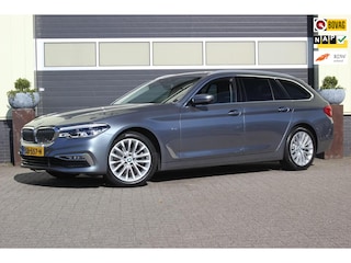 BMW 5-serie Touring 520i High Executive | Trekhaak | Head-Up |
