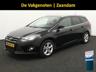 Ford Focus AUTOMAAT Wagon 1.6 TI-VCT Titanium Automaat, cruise control, sportstoelen, verwarmd voorruit, boordcomputer, airco, hill hold functie, regensensor Deze Ford Focus Wagon is de perfecte mix van comfort, ruimte en betrouwbaarheid. Met de fijne automatische transmissie, de zuinige 1.6 TI-VCT benzinemotor en de luxe Titanium-uitvoering is di