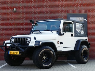 Jeep Wrangler 4.0i Sofftop / Leer